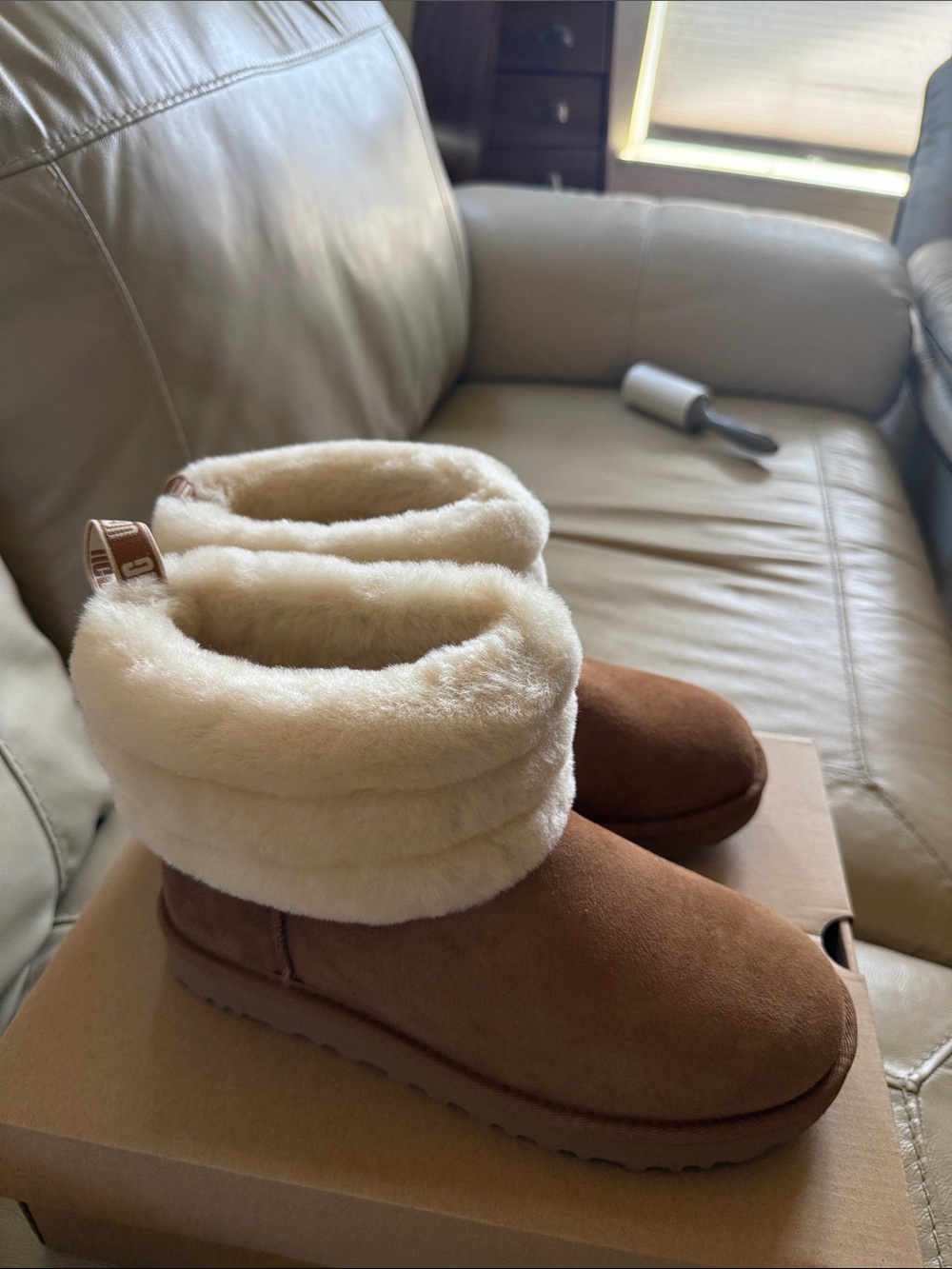 These are UGG Women's Classic Mini Fluff Quilted boots